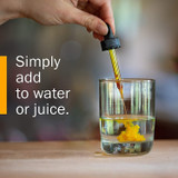 Dropper adding Herb Pharm extract to a glass of water