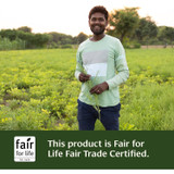 Smiling farmer in a field, Fair for Life fair trade certified graphic