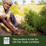 Farmer in a green field, Fair for Life Fair Trade Certified graphic