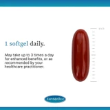Single dark red softgel beside a ruler, 1 softgel daily