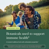 Family in a sunlit field, oregano leaf botanicals for immune health graphic