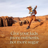 Boy leaping across red rocks, give your kids more nutrients graphic