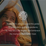 Woman by a car window, Solaray since 1973 Brighter Way graphic on sourcing quality ingredients