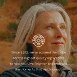 Smiling woman outdoors, Solaray since 1973 highest quality ingredients graphic
