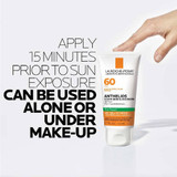 Hand applying Anthelios Clear Skin sunscreen with apply 15 minutes before sun text