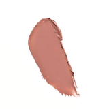 Swatch of dusty peach nude Youngblood Lipstick