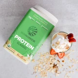 Classic Vanilla tub with powder bowl coconut flakes strawberry oats flat lay graphic