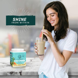 Woman drinking a vanilla shake beside the tub, shine from within graphic