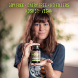 Woman holding the bottle, soy free, dairy free, no fillers, kosher and vegan graphic