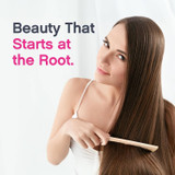 Woman with long hair holding comb, Beauty That Starts at the Root graphic