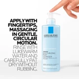 Finger pressing the Toleriane cleanser pump with how-to-use directions
