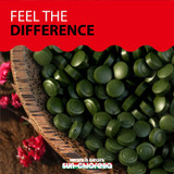 Feel the Difference wooden bowl of green chlorella tablets graphic
