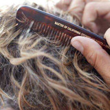 Hand combing wavy hair with Baxter tortoiseshell Large Comb