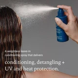 Hand spraying the leave-in onto wet hair, conditioning, detangling, UV and heat protection