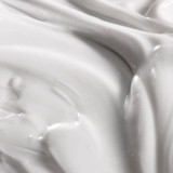 Close-up swirl of pure grace firming body emulsion texture