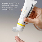 Hands squeezing sunscreen from the tube, apply liberally to face and neck directions
