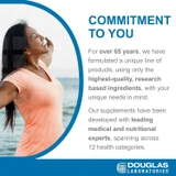 Smiling woman by the sea, Douglas Laboratories commitment to you graphic