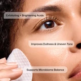 Woman wiping her cheek with a pad, ingredient benefit callouts