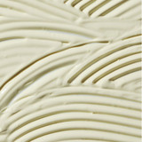 Close-up of combed cream-colored Antioxidant Daily Face Protectant texture