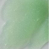 Close-up of green gel cleanser with tiny beads