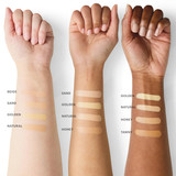 Concealer shade swatches on three arms, labeled Beige to Tawny