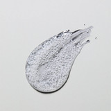 Swipe of clear gel cleanser with exfoliating beads