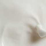 Close-up of soft white Douceur Marine cream texture