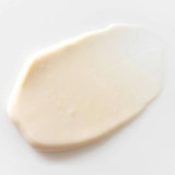 Smear of cream-colored lotion texture