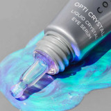 Opti Crystal eye serum tube tip with iridescent blue serum smear