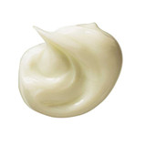 Swirl of pale yellow balm texture
