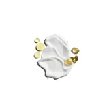 White body lotion swirl with golden oil capsules