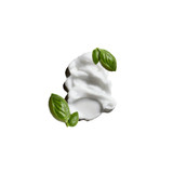 White conditioner swirl with basil leaves