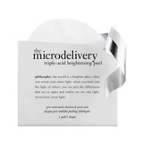 Microdelivery peel pad packet with a pad peeking out