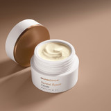 Open SkinMedica Dermal Repair Cream jar showing rich cream