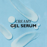 Swirls of creamy gel serum on a blue background