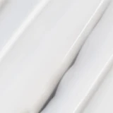 Close-up of glossy white serum swirls