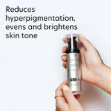 Hand holding Pigment Gel Pro, reduces hyperpigmentation and evens skin tone text