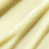 Close-up of pale yellow Dynamic Skin Retinol Serum gel texture