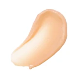 Swipe of peach-tinted primer