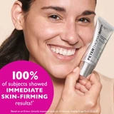 Smiling woman holding the primer tube, 100% saw immediate firming text