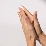 Hands rubbing in Clearing Defense lotion