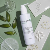 Replenix Green Tea cleanser bottle with leaves, lather swatch and capsules