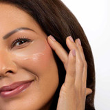 Woman wearing an eye patch under her eye