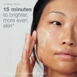 Woman with peel on her cheek, 15 minutes to brighter, more even skin