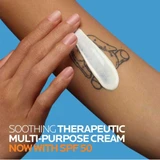 Hand spreading the balm on a forearm, now with SPF 50