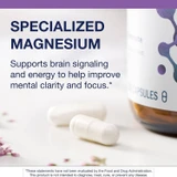 Capsules beside the bottle with specialized magnesium text