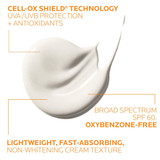 Anthelios Melt-In Milk cream texture swatch with Cell-Ox Shield and oxybenzone-free callouts