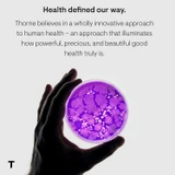 Hand holding a petri dish, Thorne health defined our way graphic