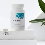 Thorne Vitamin B12 bottle with a capsule and size marker