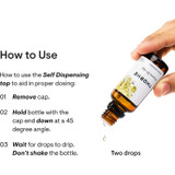 Hand tipping the bottle with self-dispensing drop instructions